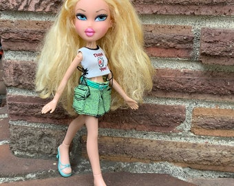 Vintage Cloe Bratz doll redressed in thank you shirt and skirt