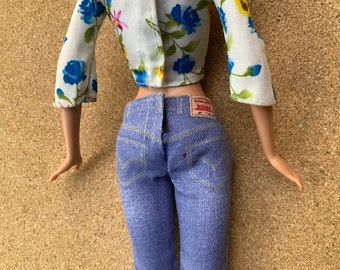 Vintage Barbie doll size Levi jeans and faux fur flower shirt and classic pumps