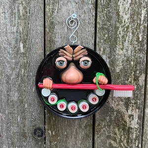 Weird upcycled bathroom Dental humor wall art brush and floss