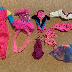 Lot of 7 Vintage Barbie doll clothes