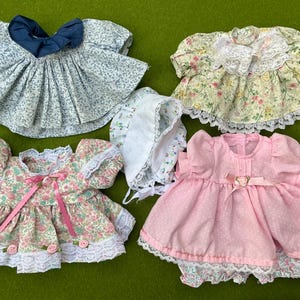 Lot of 4 Vintage Doll dresses floral