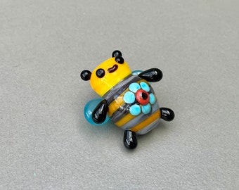 EC.. Bumblebee flower lampwork focal bead SRA