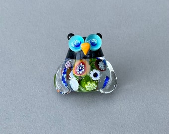 EC...Big owl Millefiori encased plunged flowers beautiful rainbow multi colored  lampwork focal bead SRA