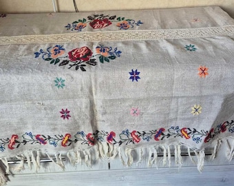 Antique hand-woven tablecloth.