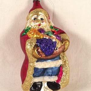 Poland Santa Christmas Ornament, Holding Fruit Basket, Hand Painted with Gold Glitter Accents