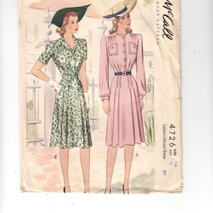 Peut inclure: Patron de couture vintage McCall's pour une robe femme, taille 14, tour de poitrine 84 cm. Le patron présente deux styles de robes, l'une avec un imprimé vert et blanc et l'autre en rose uni.