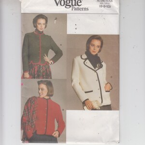 Peut inclure: Patron de couture Vogue Patterns numéro 9382 pour les tailles 6-8-10. Le patron comprend trois styles de vestes différents : une veste verte avec des bordures rouges, une veste blanche avec des bordures noires et une veste rouge avec des bordures noires.