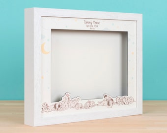 May include: White shadow box frame with a Dalmatian puppy theme. The frame has a white mat and a clear glass front. The text "Tommy Pierce, April 4th, 2024, New Born" is printed on the mat.