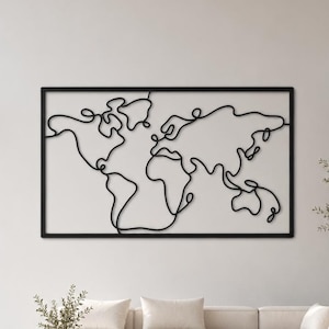 以下が含まれることがあります： 黒い金属製の長方形のウォールアートで、世界地図を一本の連続した線で描いています。このデザインは、途切れることのない一本の黒いワイヤーの輪郭で構成されており、黒い長方形のフレームの中で大陸の形をなぞっています。