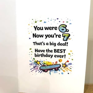 Colourful 5x7 printable birthday card for kids reading ‘You were 6, now you’re 7, happy birthday,’ shown with front and inside design, bright graffiti-style typography, confetti details, and blue envelope