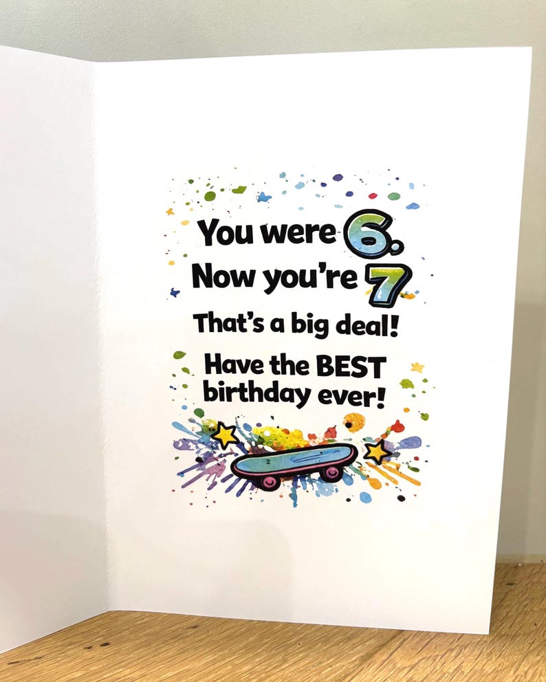 Colourful 5x7 printable birthday card for kids reading ‘You were 6, now you’re 7, happy birthday,’ shown with front and inside design, bright graffiti-style typography, confetti details, and blue envelope