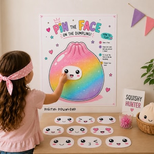 May include: A Pin the Face on the Dumpling game poster featuring a large rainbow-coloured dumpling illustration, instructions, and ten separate oval-shaped paper cutouts with various cartoon facial expressions for interactive play.
