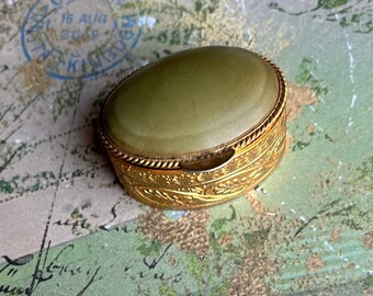 Vintage Miniature Compact Case for Pills or Snuff in Goldtone Brass Metal with Repousse Design on Green Agate Stone Inlaid Accent on Lid