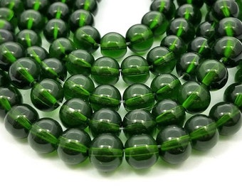 Green glass beads with a little note
