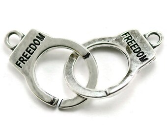 4 Handcuff Charms silver tone freedom