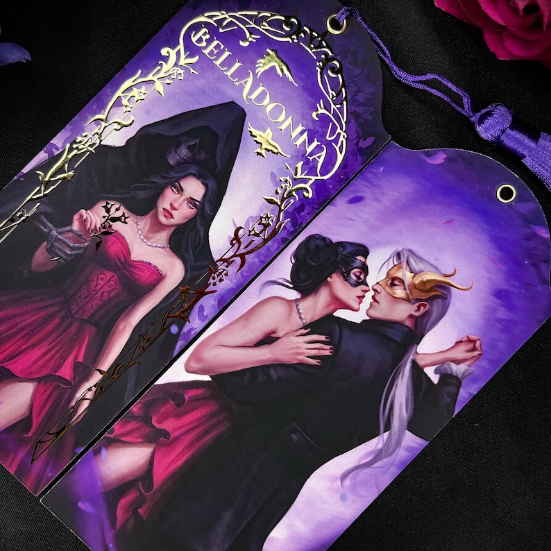 May include: Two decorative bookmarks with illustrations. One features a woman in a red dress with a skeleton figure, the other depicts a couple in formal attire. The word "BELLADONNA" is printed in gold.