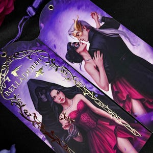 May include: Two decorative bookmarks with illustrations. One features a couple in formal attire, the other a woman in a red dress with a skeleton hand. Gold foil accents and the word "BELLADONNA" are visible.