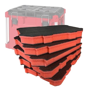 May include: A stack of red and black foam inserts for a tool box. The inserts are made of a dense foam material and are designed to protect tools during transport. The tool box is visible in the background.