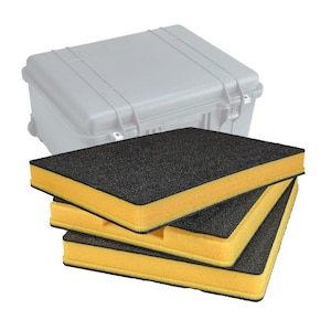 May include: Three black and yellow foam inserts, designed for a protective case. The foam is black on the top surface and has yellow sides. A grey protective case is visible in the background.