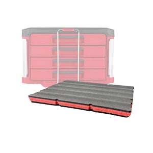 May include: A grey foam insert with red and black edges, designed for tool storage. The insert has a ridged surface and is positioned in front of a red tool chest with multiple drawers.