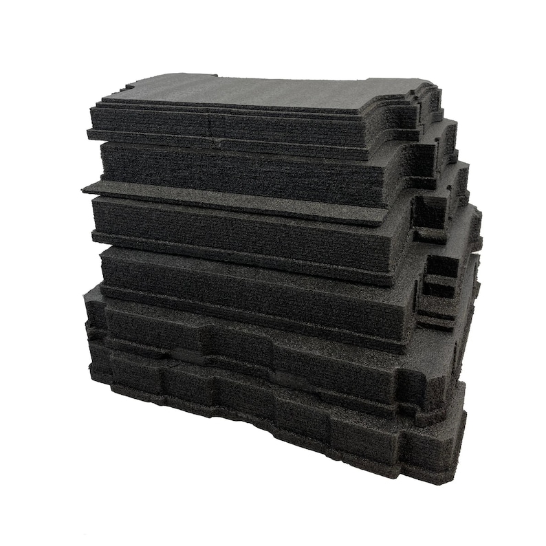 May include: A stack of rectangular black foam inserts with textured surfaces and notched edges. Each piece features a consistent layered design with precise cutouts along the sides, arranged vertically to form a uniform block of protective material.