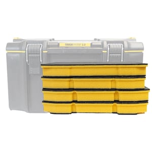 May include: Yellow and black foam inserts for a tool storage system. The inserts are rectangular with a black border. The background shows a gray tool box with the text "TOUGH SYSTEM 2.0".