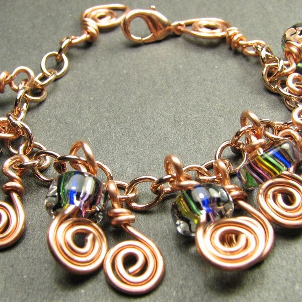 Spiral Rainbows - Copper charm bracelet with rainbow furnace beads and lobster clasp