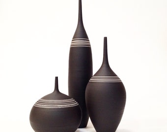 3 Black and White stoneware bottle vases. unglazed raw black clay with white porcelain stripes by Sara Paloma Pottery. large black vase set