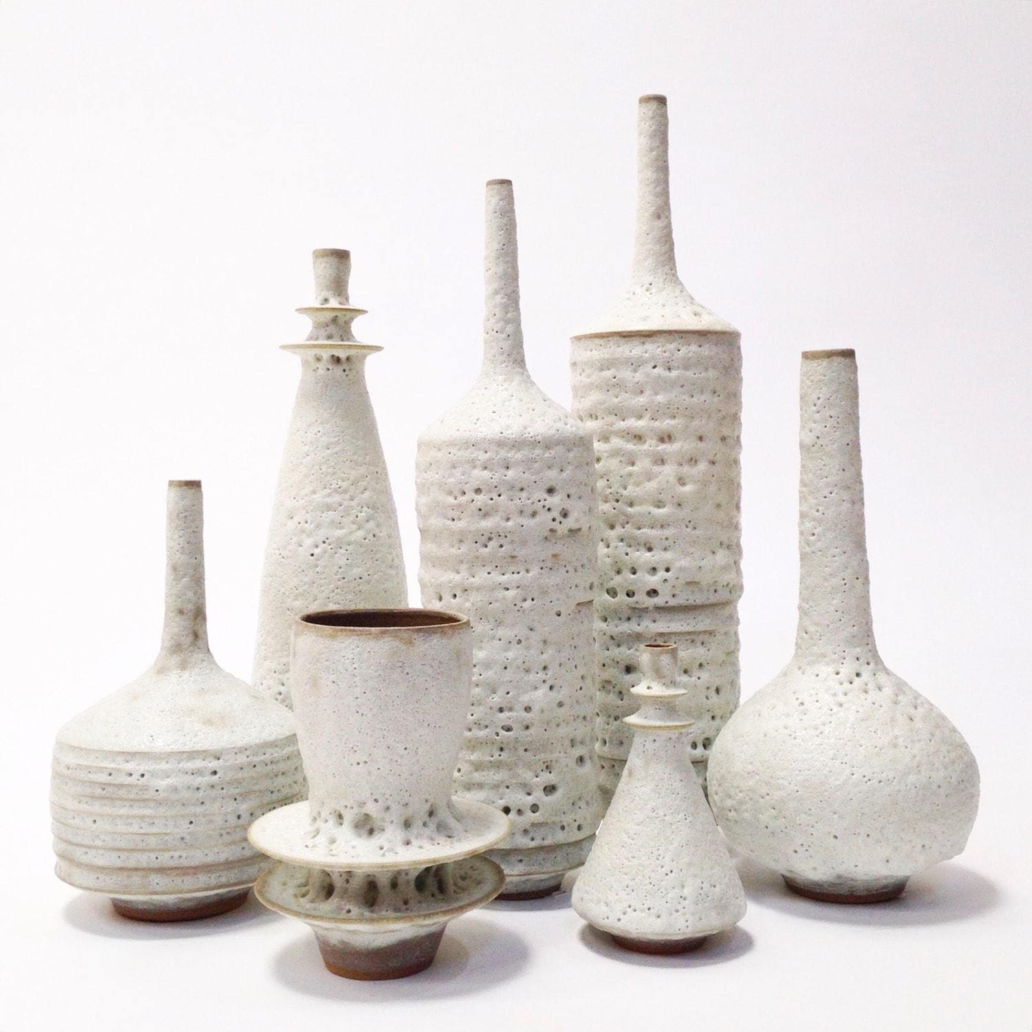 Grand Collection Of 7 Sculptural Stoneware Architectural Ceramic Vases in White Crater Glaze By Sara Paloma Pottery. Light Earthy Natural
