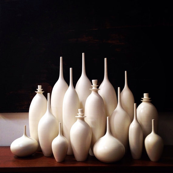 Grand Collection of 16 Large White Matte Ceramic Bottle Vases by Sara Paloma. Mid Century Modern Credenza Top Tall Floor Vase Silhouette
