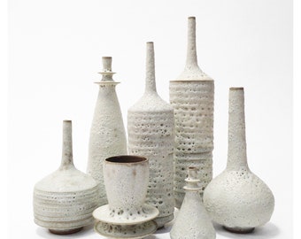 ONE Minimalist Handmade Ceramic Stoneware Flanged Bud Vase Glazed in a Textural White Matte Crater Lava Glaze by Sara Paloma Pottery.
