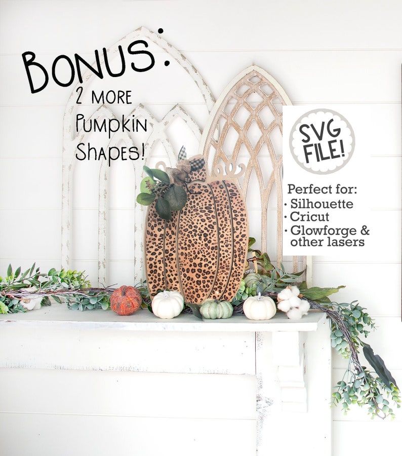 May include: A wooden pumpkin with a leopard print design. The pumpkin is sitting on a white mantel with other pumpkins and greenery. The text "BONUS: 2 MORE Pumpkin SHAPES!" is above the pumpkin. The text "SVG FILE!" is in a circle above the text "Perfect for: Silhouette Cricut Glowforge & other lasers".