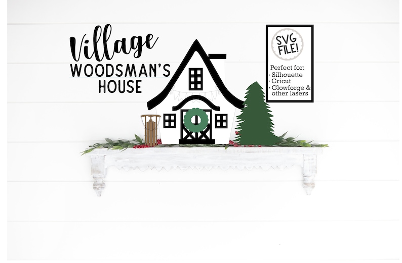 May include: Black and white silhouette of a village house with a wreath on the door, a Christmas tree, and a sled. The text "Village Woodsman's House" is above the house. The text "SVG FILE! Perfect for: Silhouette Cricut Glowforge & other lasers" is in a white box with a black circle containing the text "SVG FILE!" in the upper right corner.