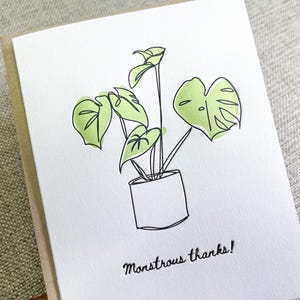 Merci monstrueux, dessin de plante monstera, carte typographique