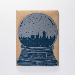 Tarjeta navideña con forma de bola de nieve de San Francisco (impresión tipográfica)