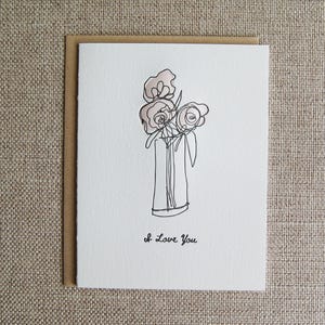 Je t'aime, carte typographique de dessin au trait de vase de fleur