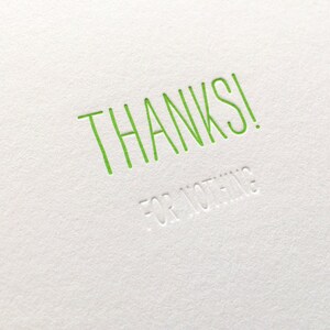 Message caché : Merci pour rien - Carte typographique