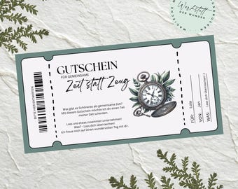 May include: A gift certificate with a teal border and a vintage pocket watch illustration. The text on the certificate reads "Zeit statt Zeug" and includes space for "For" and "From" details. Decorative sprigs frame the design.