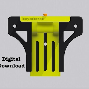 May include: A black and yellow 3D printed wall mount with the text "boycabrera" printed on the top. The text "Digital Download" is printed below the mount.