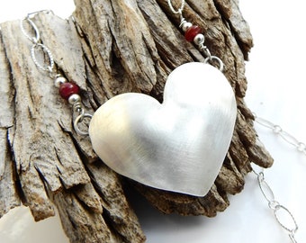 A Solid Heart Necklace - Sterling silver heart with ruby accents