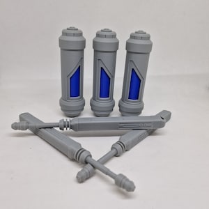 May include: Three grey cylindrical containers with blue accents and a grey, textured, cylindrical handle.