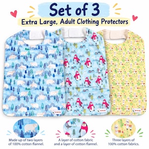 May include: A set of 3 extra large adult clothing protectors featuring three distinct patterns: a light blue polar bear and tree print, a light blue penguin and mountain print, and a yellow llama and cactus print, each with a white neck closure.