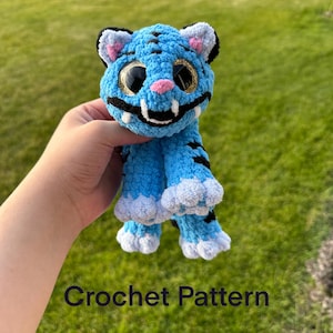 PDF Häkelanleitung: Peinlicher blauer Tiger Snuggler