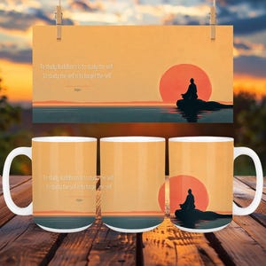 May include: Three white ceramic mugs with a wraparound design featuring a meditating figure silhouetted against a sunset. The mugs also display the text "To study Buddhism is to study the self. To study the self is to forget the self."