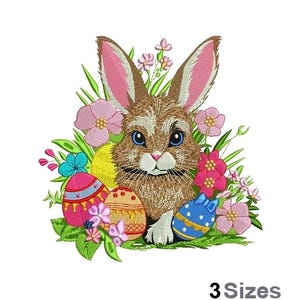 May include: An embroidered Easter design featuring a brown bunny with pink-lined ears, surrounded by colorful Easter eggs and pink flowers. The design includes the text "3 Sizes" at the bottom.