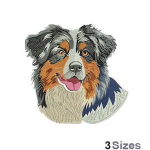 Może przedstawiać: Haftowany wzór przedstawiający psa pasterskiego australijskiego z niebieskim, brązowym i białym futrem. Pies patrzy bezpośrednio na widza z lekko otwartą paszczą, pokazując język. Pies nosi niebiesko-białą obrożę.