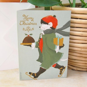 Carte de Noël Souris Louis | Shopping de Noël nostalgique sur patins | Cartes de Noël mignonnes et douces dessinées à la main