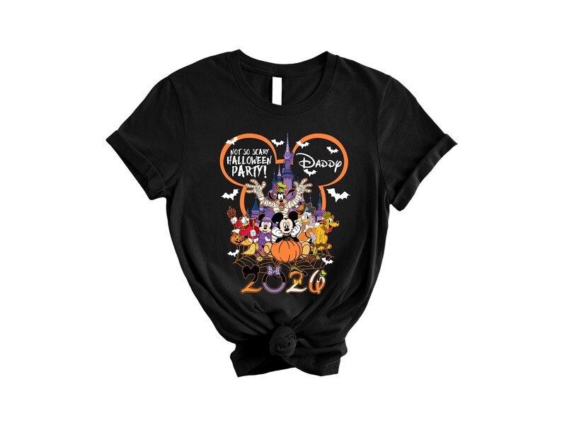 May include: A black short-sleeve t-shirt featuring a graphic of Disney characters in Halloween costumes. The design includes the text "NOT SO SCARY HALLOWEEN PARTY!" and "DADDY" inside a Mickey Mouse ear outline, with "2026" at the bottom.