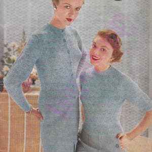 May include: A vintage knitting book cover featuring two women wearing light blue knitted cardigans. The cover is titled "Munrospun Knitting Book No. 14".