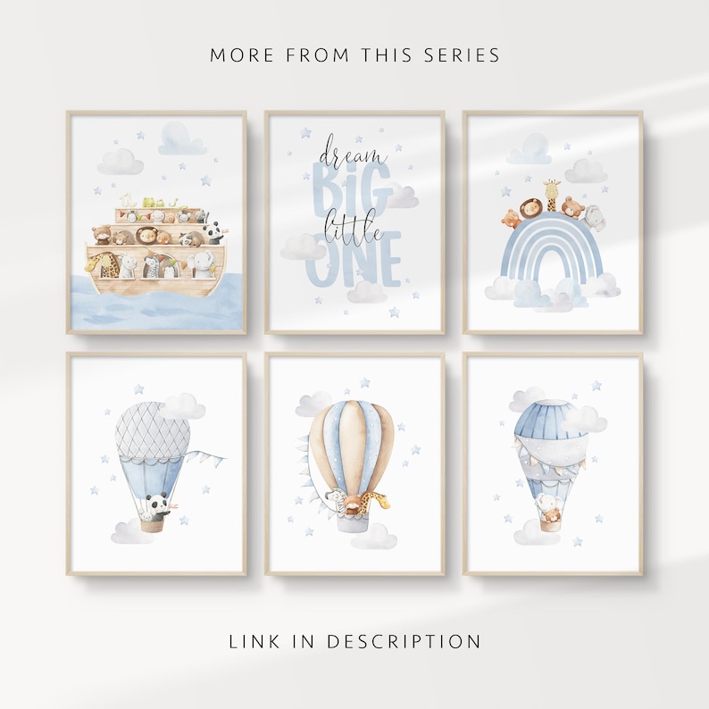 May include: Six framed watercolor prints with a nursery theme. The prints feature animals on an ark, a blue rainbow, hot air balloons, and the text "dream BIG little ONE". The color palette includes blue, beige, and white.